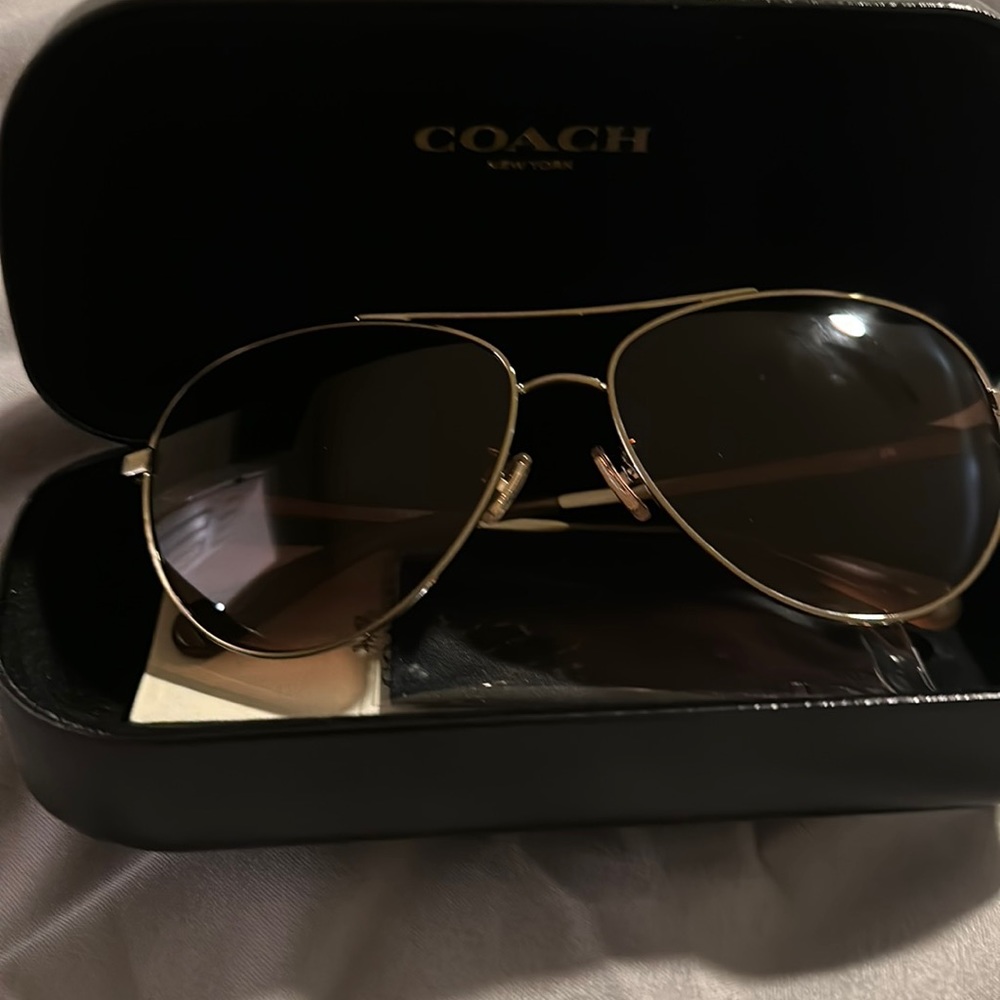 Coach sunglasses brown tint to glasses
